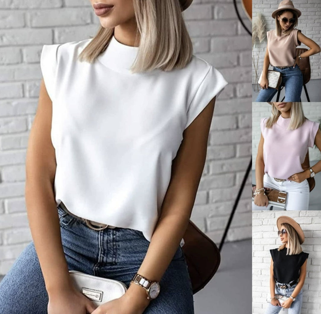 Minimalist summer shirt for women with soft, short sleeves and a modern stand collar. Perfect button-up top for stylish comfort and casual elegance.