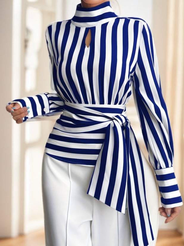 This striped long sleeve top features a soft cotton feel and minimalist designperfect for layering, casual days, or classic fitted styles for women.

